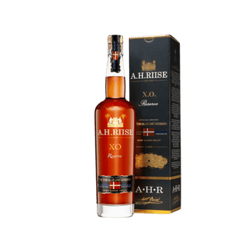 A.H. Riise XO Reserve aged rum bottle beside its black and gold branded box with Danish flag accents