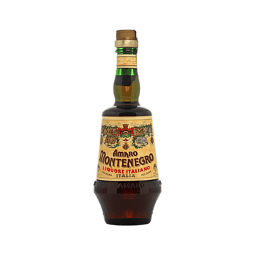 Bottle of Amaro Montenegro Italian herbal liqueur with ornate vintage label and gold cap