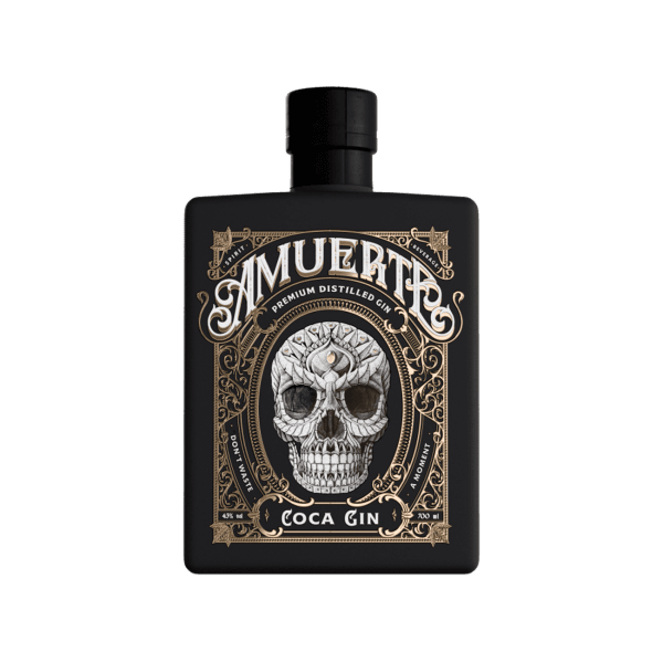 Black bottle of Amuerte premium distilled gin with ornate gold skull design and coca gin label