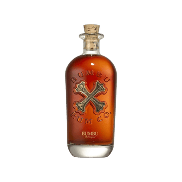 Bumbu The Original rum bottle with cork and gold X logo on clear background