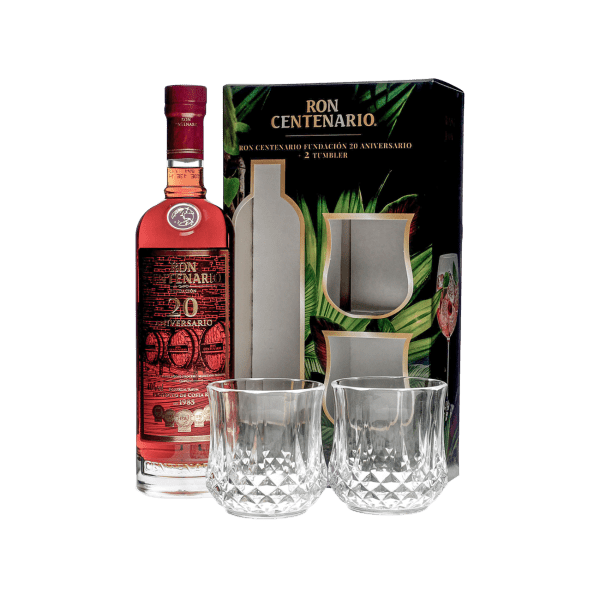 Ron Centenario 20 Aniversario rum bottle with two clear crystal tumblers and branded black packaging