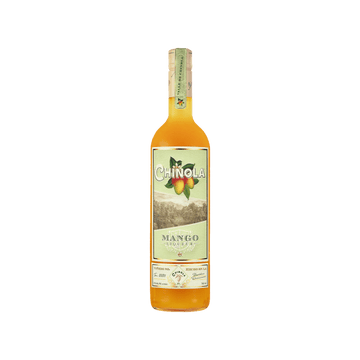 Chinola Mango Liqueur bottle with orange-yellow liquid and tropical mango label