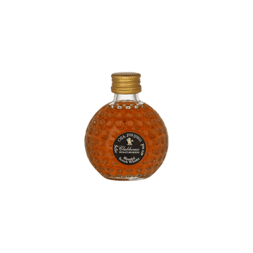 Round golf ball textured bottle of Clubhouse blended Scotch whisky with gold cap