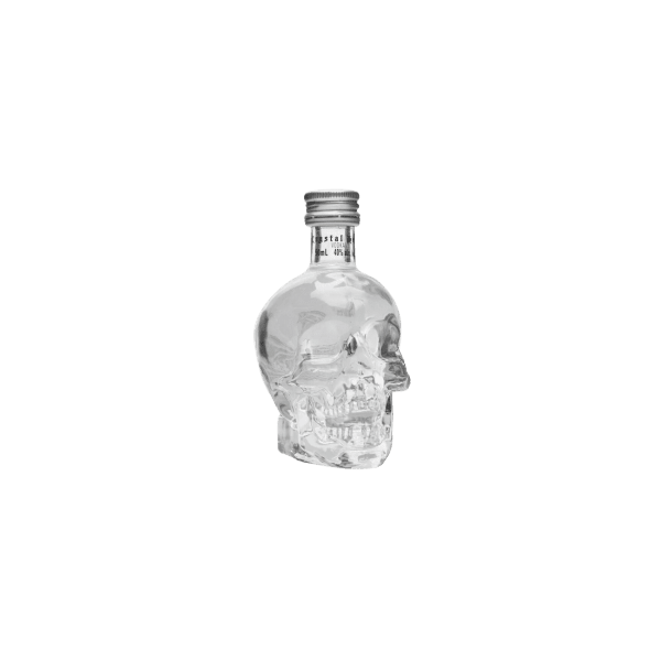 Clear glass skull-shaped bottle with silver cap on transparent background