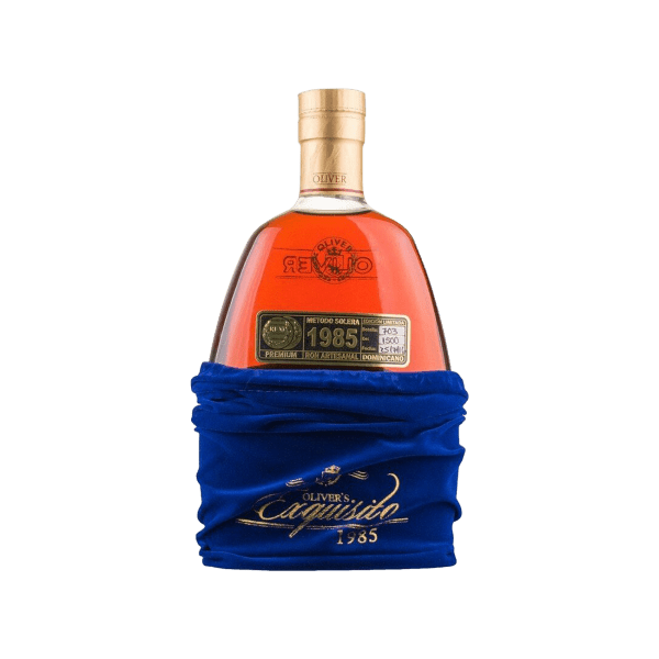 Bottle of Oliver's Capusillo 1985 premium Dominican rum partially wrapped in blue velvet pouch