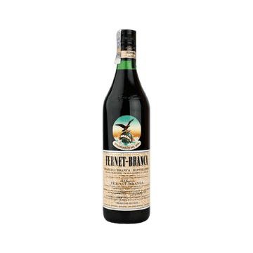 Fernet Branca herbal liqueur bottle with beige label on white background