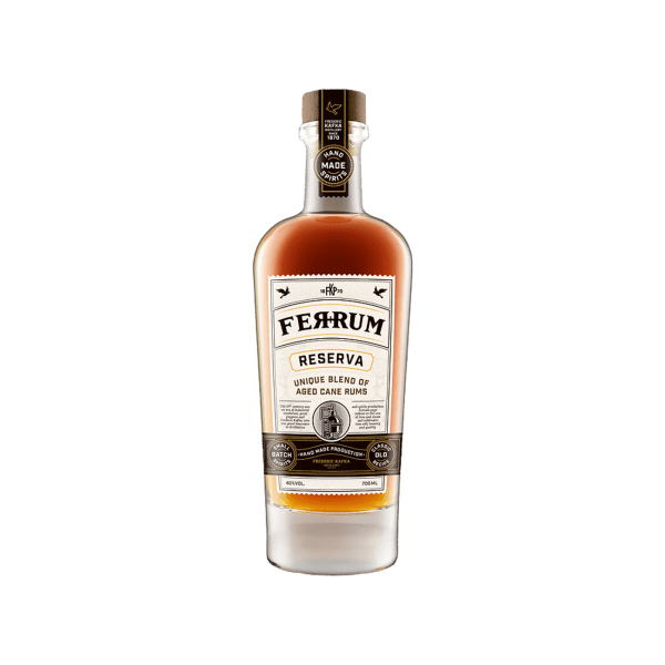 Ferrum Reserva aged cane rum bottle with beige label and brown liquid, isolated on white background.