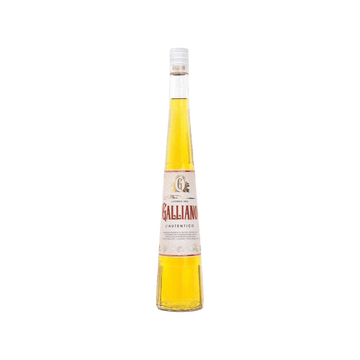 Tall bottle of Galliano L'Autentico Italian liqueur with golden yellow liquid