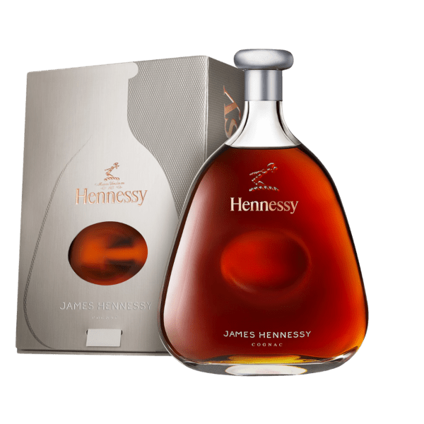 James Hennessy cognac bottle with silver cap beside its silver and embossed packaging box