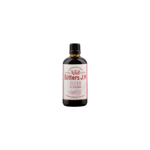 Brown glass bottle of Bitters J.M Fleur d'Automne with black cap and pink label