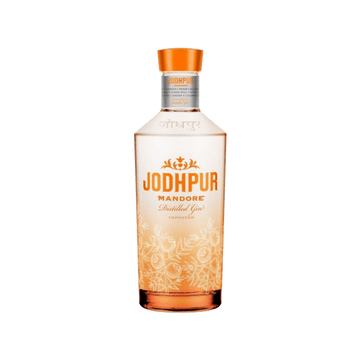 Jodhpur Mandore Distilled Gin bottle with orange cap and floral design on clear glass