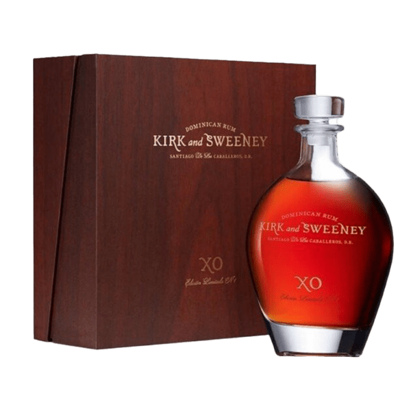 Kirk and Sweeney XO Dominican rum bottle with rich amber liquid beside elegant wooden gift box