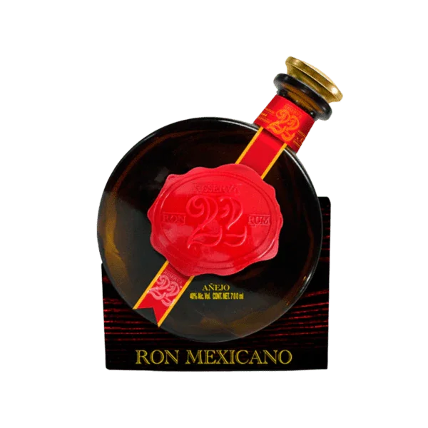 Mexican rum bottle with red wax seal, unique round design, labeled 'Ron Mexicano'.