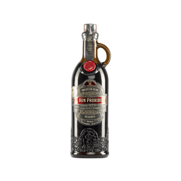 Ron Prohibido Reserva Mexican rum bottle with embossed detailing on a white background