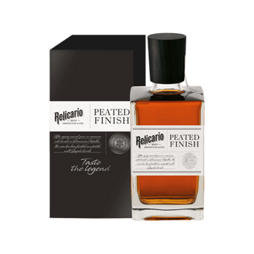 Premium rum bottle labeled 'Relicario Peated Finish' with matching gift box