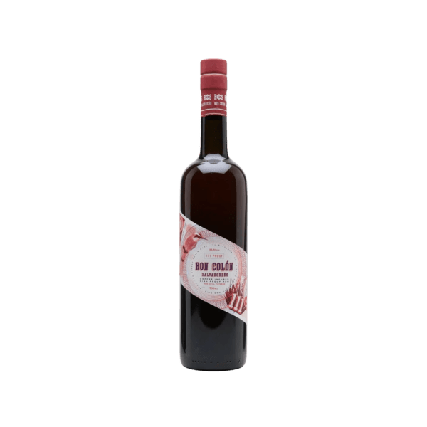 Ron Colón Salvadoreno dark rum bottle with red label on white background