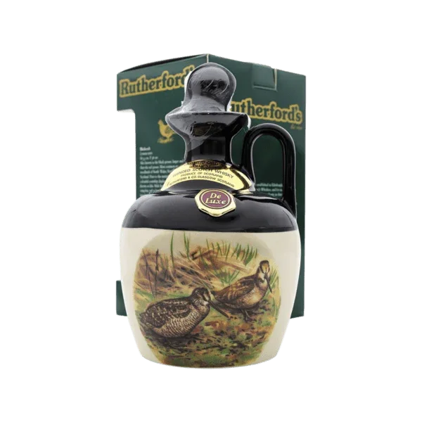 Ceramic whisky decanter with bird illustration, collectible liquor bottle and box