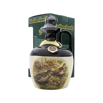 Ceramic whisky decanter with bird illustration, collectible liquor bottle and box