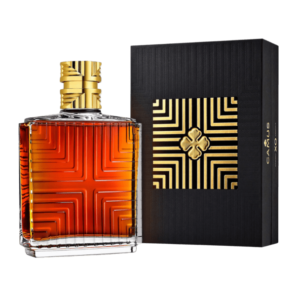 Square bottle of amber liquor with gold geometric pattern and black box with matching gold design