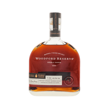 Woodford Reserve Double Oaked bourbon whiskey bottle with brown liquid and clear label