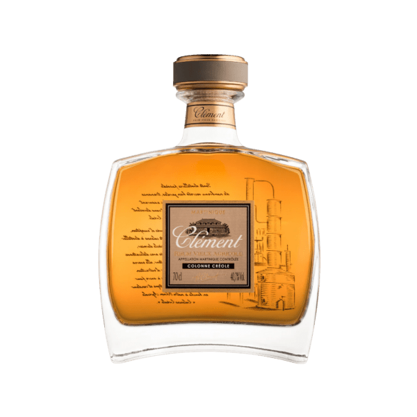 Elegant bottle of Clément Martinique rum with gold liquid and decorative label, isolated